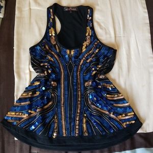 Almost Famous sequined top.